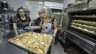 Syrian Armenian refugees celebrate with a Christmas lunch in Montreal