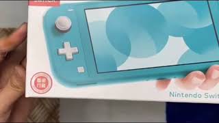 Unboxing Nintendo Switch Lite Turquoise & Fitting Different Cases.