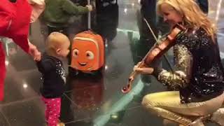 So Cute! Serenading a baby at the Vancouver Airport! Rosemary Siemens