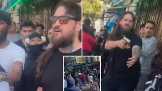 Liquor store worker pulls gun on mob of bicyclists surrounding California store after they attackhim