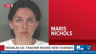 Douglas County teacher faces new charges