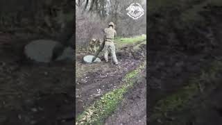 Ukrainian SSO Special forces soldiers fire a 120mm mortar