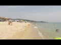 sarti beach walk along the beach. 4k video