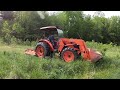 extreme hillside bush hogging with the kubota m6060 this one made me kinda uneasy.