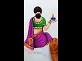 ladies rangoli with diya. short