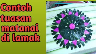 contoh tuasan motif matahari di lamak