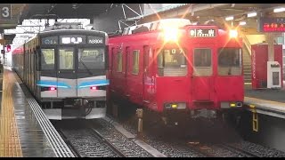 雨の中の名鉄柏森駅 名古屋地下鉄鶴舞線N3000形の普通赤池行きと名鉄200系の普通犬山行き