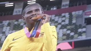 really shaky 😂Medal Ceremony For Peruth Chemutai After Her Olympic Gold Medal In The Steeplechase.