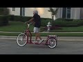 georgia lopifit owner riding his new red lopifit bike