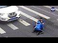 this little boy in china is his mummy s hero he vented his anger at a car that sent his mum flying