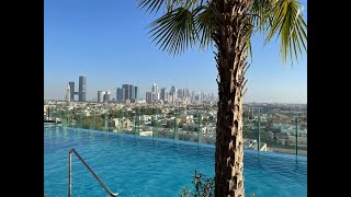 United Arab Emirates, Dubai, Aloft Al Mina - rooftop pool with amazing view and Burj Khalifa