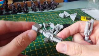 Unboxing a tau xv9 battlesuit  with twin link burst cannons