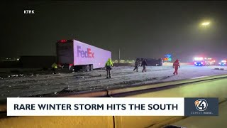 Rare winter storm hits south