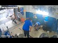 caught on camera ouch man hit by metal bar twice in brazil car shop