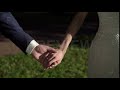 bride and groom hold hands stock video