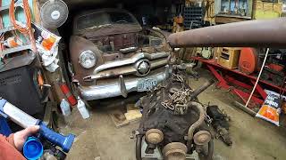 working on the 1949 ford shoebox update and taking parts off the engine to sell