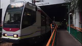 港鐵輕鐵（路綫615P）第一期列車（1036 + 1070）駛離良景站一台