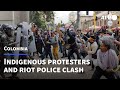 Indigenous protesters and riot police clash in Bogota | AFP