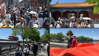 Los chinos salen en masa a las calles sin miedo a la pandemia | AFP