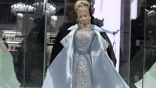 Montreal exhibit displays Barbies decked out in haute couture