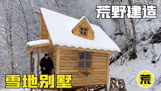 Man building a villa in the snow with his bare hands