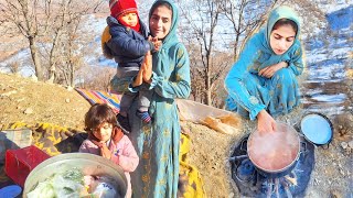 A nomadic mother and her children in the snow: a brutal struggle for survival