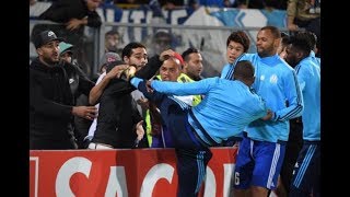 Patrice Evra kicking a Marseille fan in the head prior to Europa League match with Vitoria Guimaraes