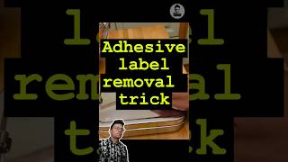 Adhesive label removal trick