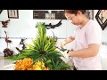 Cắm hoa bàn thờ bình hoa Lan Thái và Lan Mokara kết hợp lá dừa