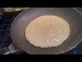 cooking breakfast in rv sourdough pancakes farm fresh eggs sausage blue and red raspberry