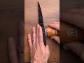 taking on the challenge to sharpen an obsidian knife with tumbler rolling sharpener