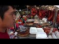 cambodia street food hardworking guy selling roasted duck pork rips fish u0026 pigs intestine