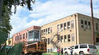 Why did the district chose to close those four schools?