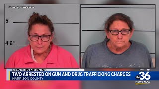 Two arrested on gun, drug trafficking charges