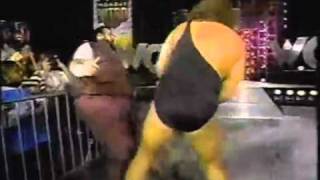 The Giant (Big Show) beats up Loch Ness (Giant Haystacks)