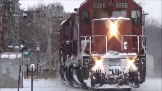 Classic EMD SD40-2's Busting Through Snow!