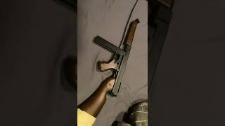 Reviewing a d98 well airsoft Thompson submachine gun