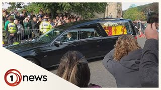 Respect and love as Queen’s coffin driven through Scotland