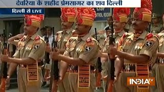 Union Minister Kiran Rijiju pays tribute to Martyr Prem Sagar at Delhi Airport