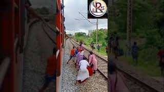 Railway Track Ruckus: Passengers Cross Seconds Before Train's Arrival | #Shorts | #ViralVideo