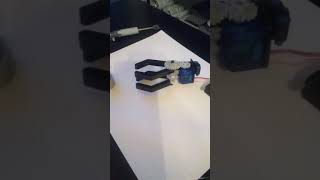 Motorized Lego grabber controlled by a raspberry pi