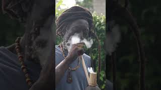 Rasta man smoking his chalice #jamaica #rasta #rastafari #fire #wisdom #country