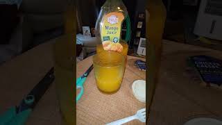 Drinking Swad Mango Juice, Dbn, MI, 1/31/2025