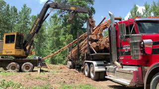 Tigercat 234B Loading 12,000 Pounds Every Grapple Full!!!