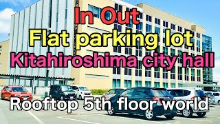 In Out .Flat parking lot .Kitahiroshima City Hall Rooftop5th  floor world July 2022 Hokkaido, Japan