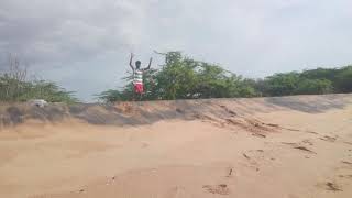 Front flip on beach slope