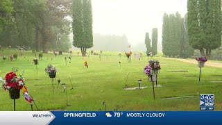 Volunteers help serve as grave finders