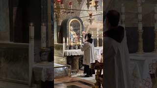 Christian ceremony of worship in front of the statue of the Virgin Mary. Jerusalem, Israel 2024