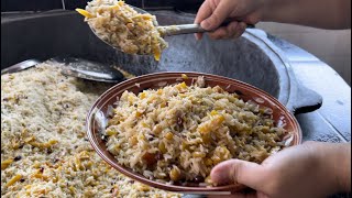 Unique style of pilaf. famous street food. Pilaf in the pilaf center