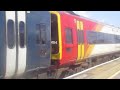 that is a swr train class 159018 159021 and 159104 in clapham junction